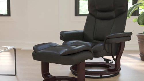 Black leather recliner chair best sale with footstool